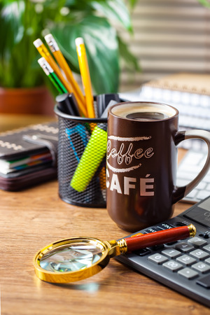 Business Objects office expanded in composition on a tableの写真素材