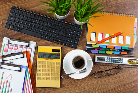 Business Objects office expanded in composition on a tableの写真素材