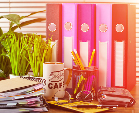 Business Objects office expanded in composition on a tableの写真素材