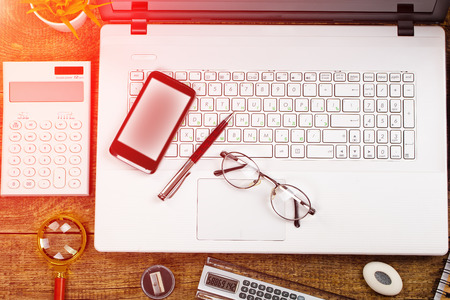 Business Objects office expanded in composition on a tableの写真素材