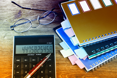 Business Objects office expanded in composition on a tableの写真素材