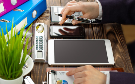 Business Objects office expanded in composition on a tableの写真素材