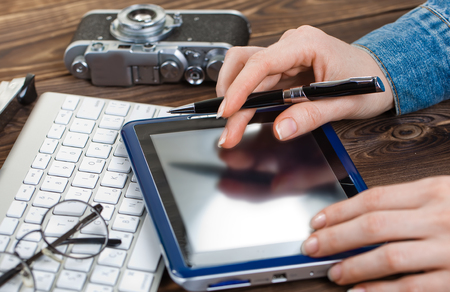 Business Objects office expanded in composition on a tableの写真素材