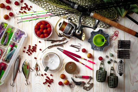 Fishing accessories in the composition on the tableの写真素材