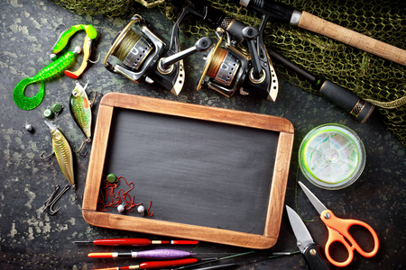 Fishing accessories in the composition on the tableの写真素材