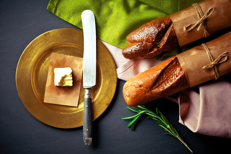 bread in composition with kitchen utensilsの写真素材
