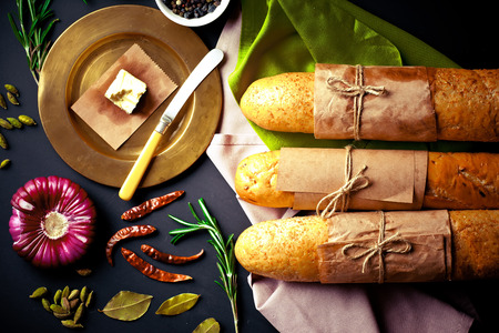 bread in composition with kitchen utensilsの写真素材