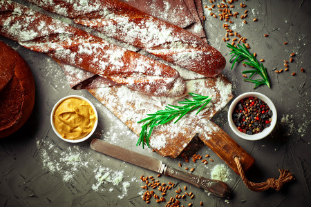 bread in composition with kitchen utensilsの写真素材