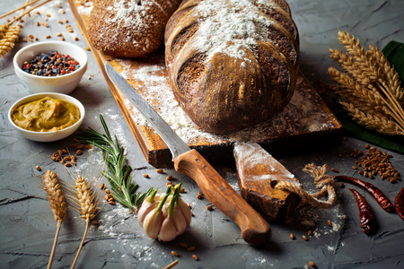 bread in composition with kitchen utensilsの写真素材