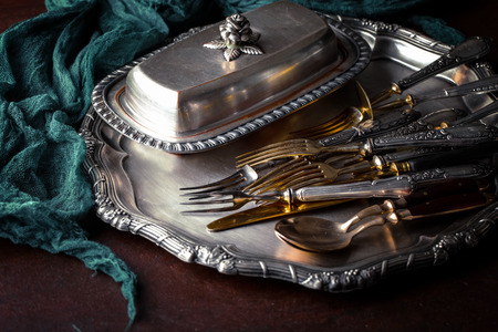 Old silver dishes with accessories for the kitchenの写真素材