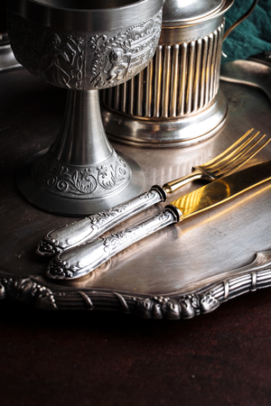 Old silver dishes with accessories for the kitchenの写真素材