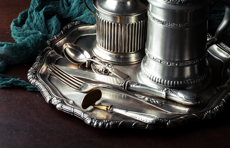 Old silver dishes with accessories for the kitchenの写真素材