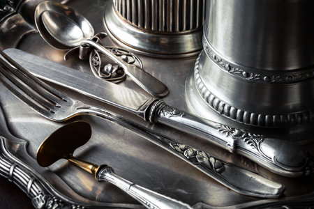 Old silver dishes with accessories for the kitchen