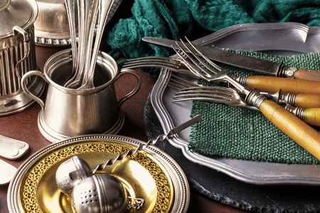 Old silver dishes with accessories for the kitchenの写真素材