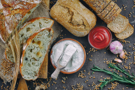 Bread products on the table in composition