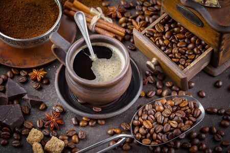 Black coffee on an old background in a cupの写真素材