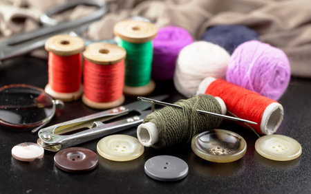 Threads, needles and sewing items.