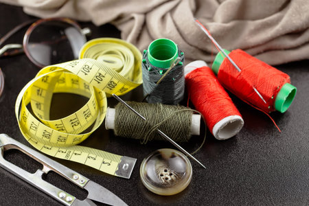 Threads, needles and sewing items.