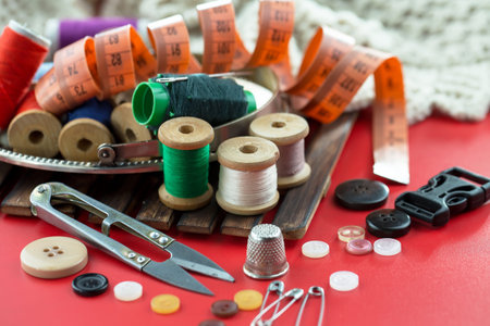 Threads, needles and sewing items.