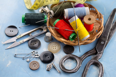 Threads, needles and sewing items.