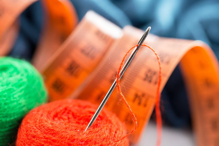Threads, needles and sewing items.