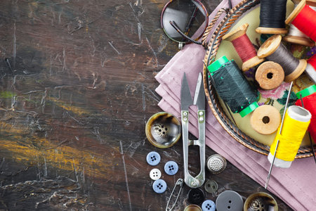 Threads, needles and sewing items.