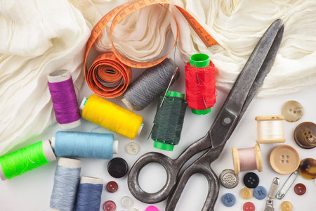 Threads, needles and sewing items.