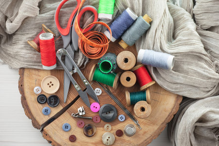 Threads, needles and sewing items.