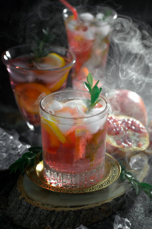 Refreshing summer alcoholic cocktail with crushed ice and citrus fruits