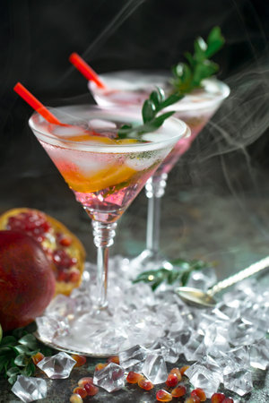 Refreshing summer alcoholic cocktail with crushed ice and citrus fruits