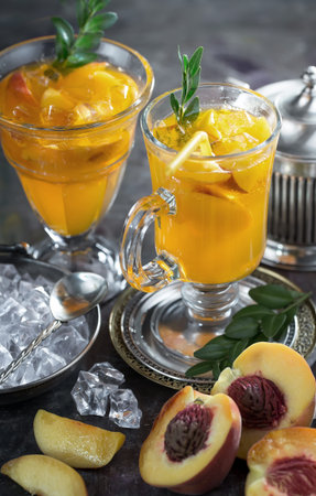 Refreshing summer alcoholic cocktail with crushed ice and citrus fruitsの写真素材