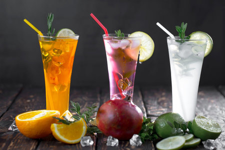 Refreshing summer alcoholic cocktail with crushed ice and citrus fruitsの写真素材