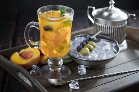 Refreshing summer alcoholic cocktail with crushed ice and citrus fruits