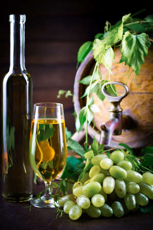 Wine in a glass on an old backgroundの写真素材