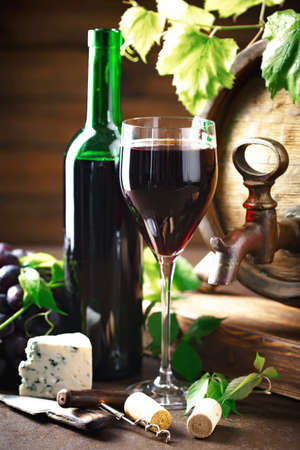 Wine in a glass on an old backgroundの写真素材