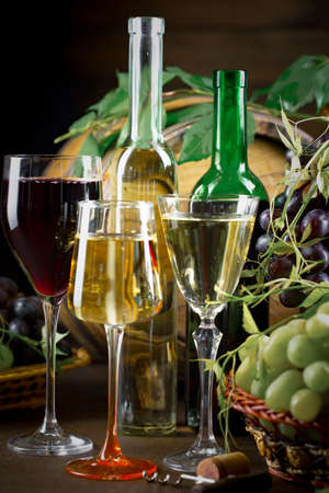 Wine in a glass on an old backgroundの写真素材