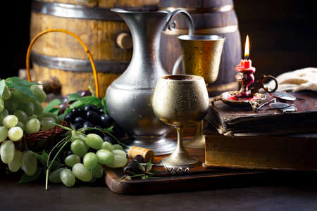 Wine in a glass on an old backgroundの写真素材