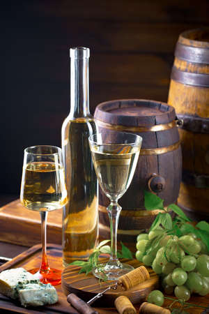 Wine in a glass on an old backgroundの写真素材