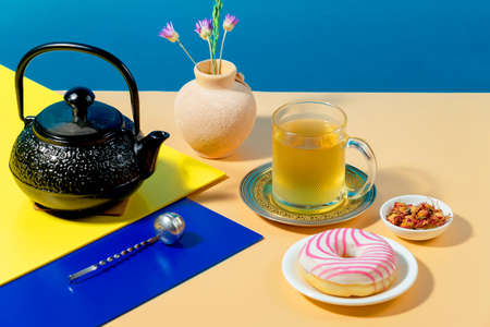Tea with dessert on a bright colored backgroundの写真素材