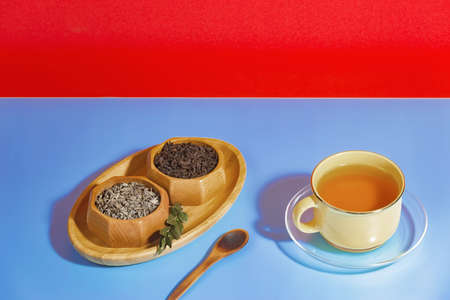 Tea with dessert on a bright colored backgroundの写真素材