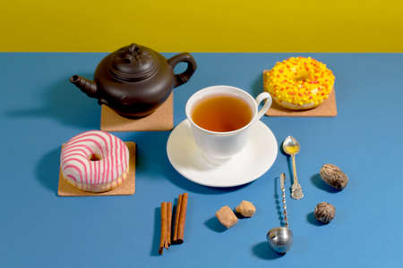 Tea with dessert on a bright colored backgroundの写真素材