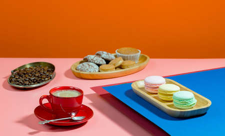 Coffee with dessert on a bright coloredの写真素材