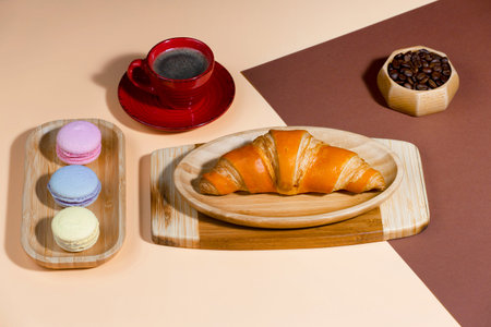 Coffee with dessert on a bright coloredの写真素材