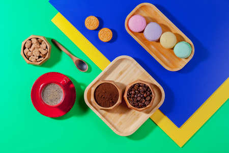 Coffee with dessert on a bright coloredの写真素材