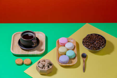Coffee with dessert on a bright coloredの写真素材