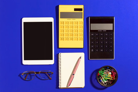 Items for business on bright colors in the office on the table