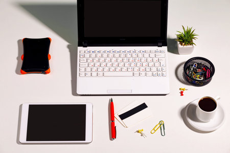 Items for business on bright colors in the office on the table