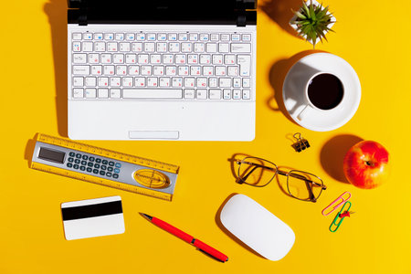 Items for business on bright colors in the office on the tableの写真素材