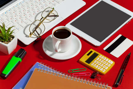 Items for business on bright colors in the office on the tableの写真素材