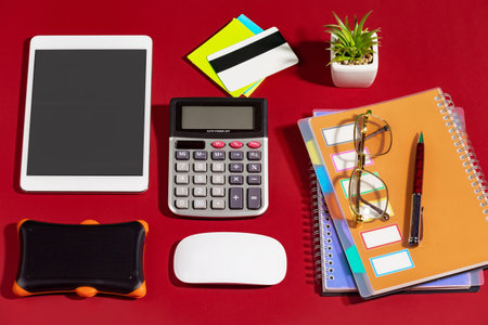 Items for business on bright colors in the office on the tableの写真素材